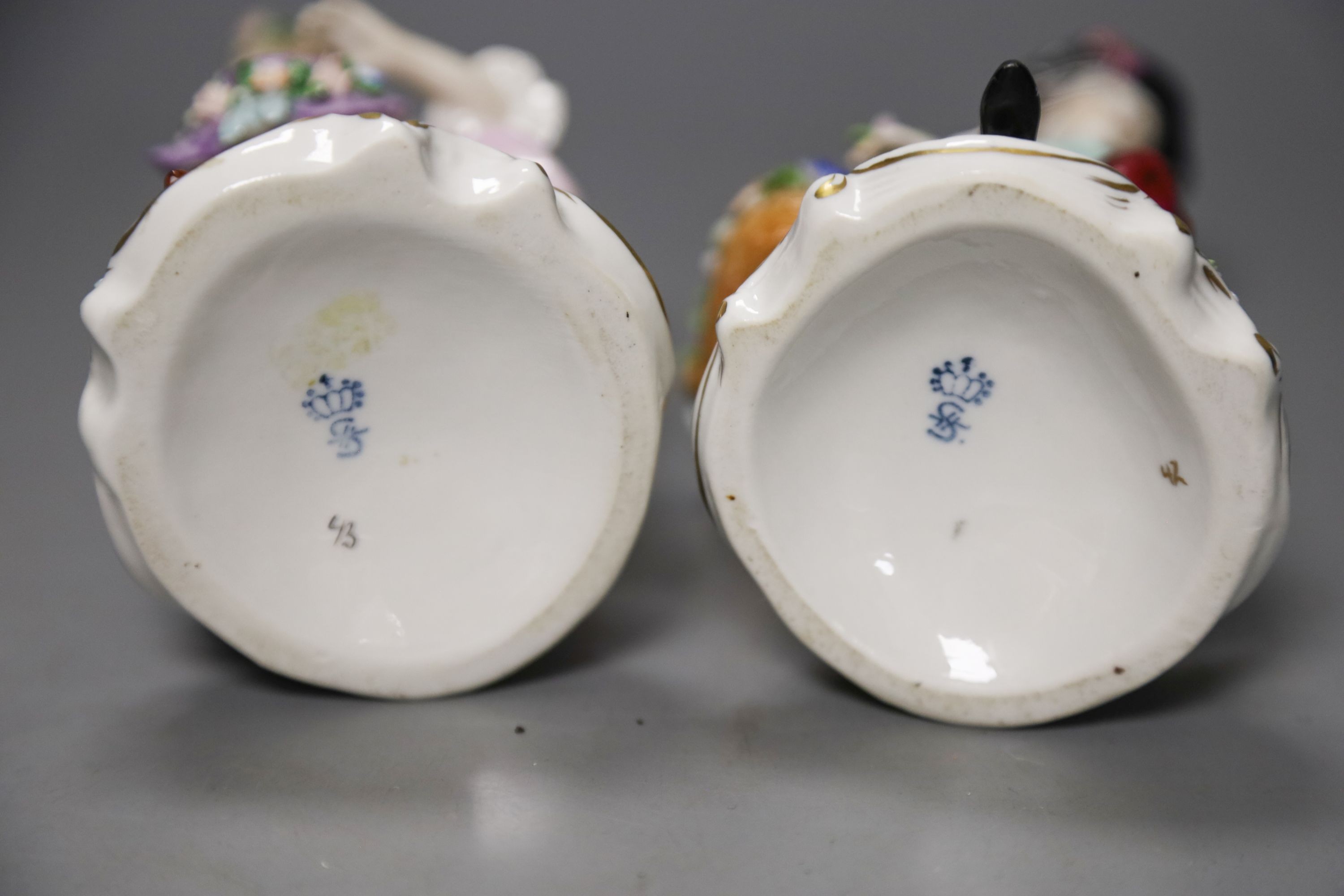 Two pairs of Continental porcelain figures, 35cm